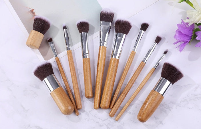 11 bamboo handles, makeup brush, tool set, linen bag, blush brush, foundation brush, and a full set of makeup..