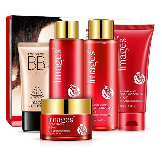A Facial Care Set from the brand Sweet Deals, featuring pomegranate-themed packaging in red and gold tones. Includes bb cream, toner, two bottles, and a moisturizing cream.