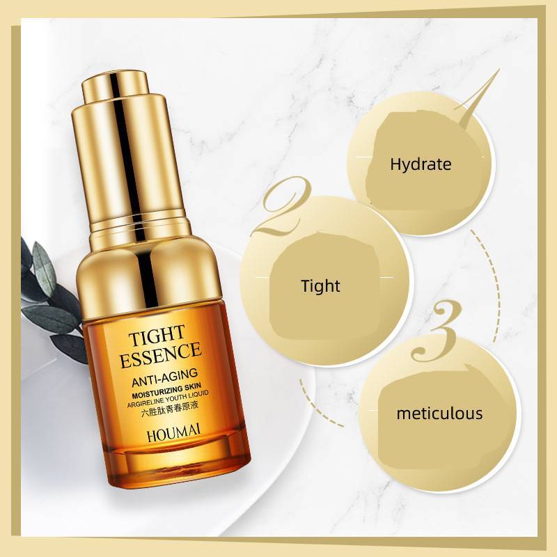 A Care And Brightening Skin Care product labeled &quot;tight essence anti-aging moisturizing skin essence&quot; by Sweet Deals. The gold-toned bottle sits on a marbled surface, surrounded by tags reading &quot;hydrate,