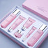 An elegant skin care set of pink Beauty Salon Facial Care Cosmetics by Sweet Deals, including bottles and tubes, neatly arranged in a matching open box on a light blue background.