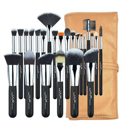 A collection of 24 makeup brushes by Sweet Deals, displayed neatly alongside a tan leather makeup bag. The brushes vary in size and shape for different makeup applications.