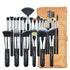 A collection of 24 makeup brushes by Sweet Deals, displayed neatly alongside a tan leather makeup bag. The brushes vary in size and shape for different makeup applications.