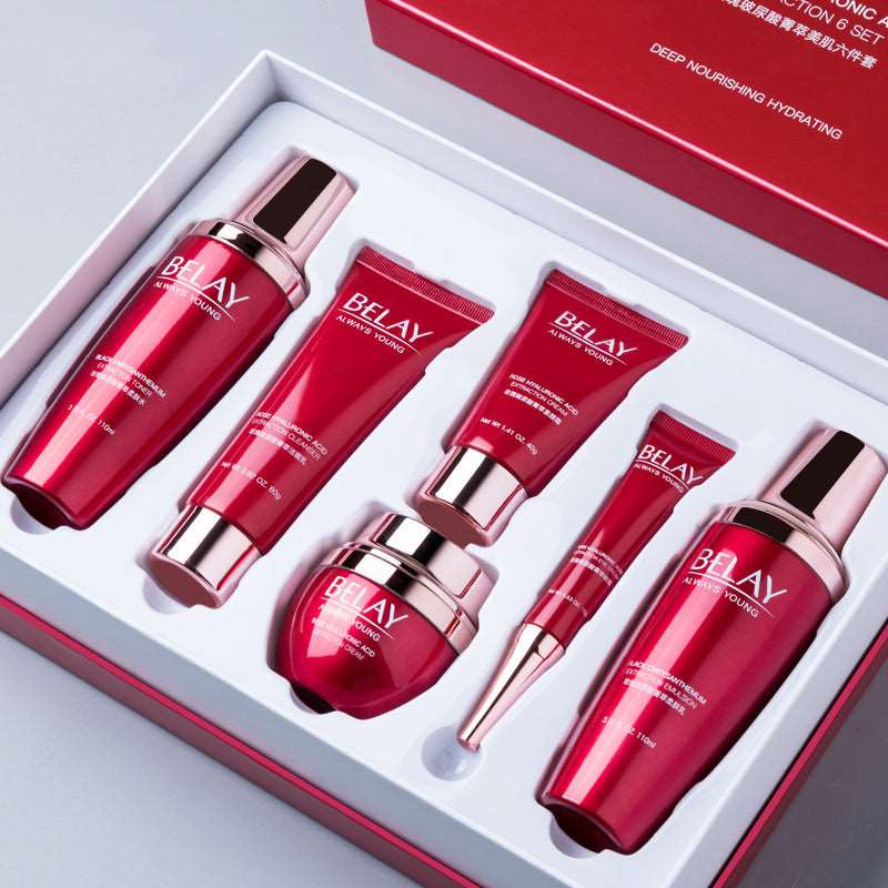 A set of Sweet Deals Beauty Salon Facial Care Cosmetics in a red and white box, containing bottles and tubes in shades of pink and red, presented on a light gray background.